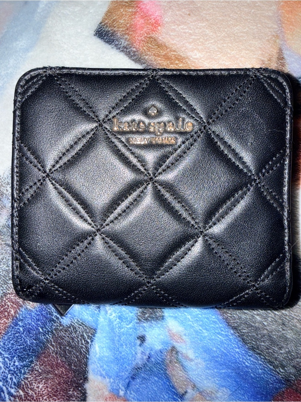 kate spade black quilted leather zip wallet